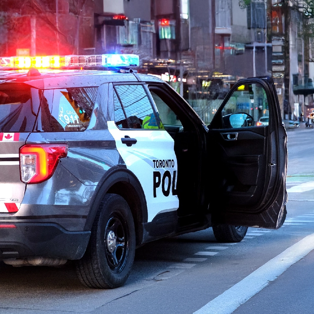 Toronto police SUV with flashing lights on street
